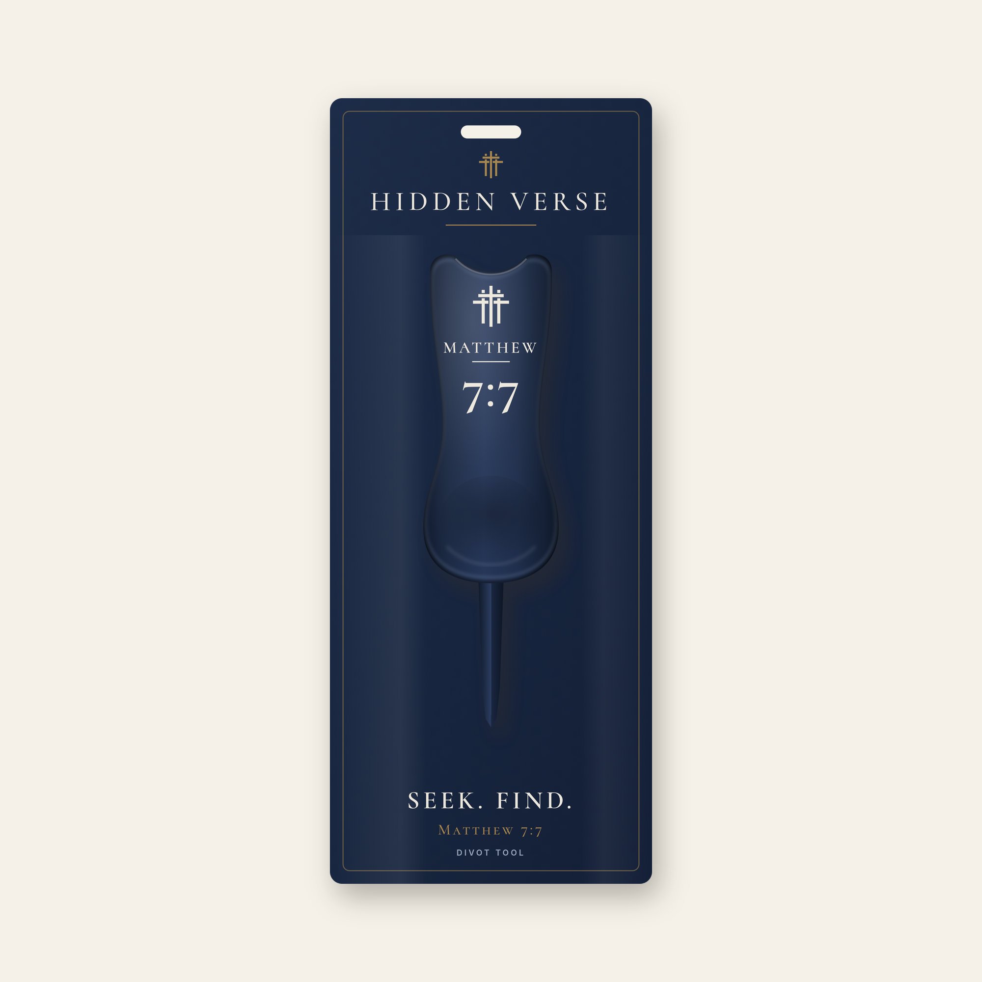 Navy divot tool on its card, with a three-cross and Matthew 7:7